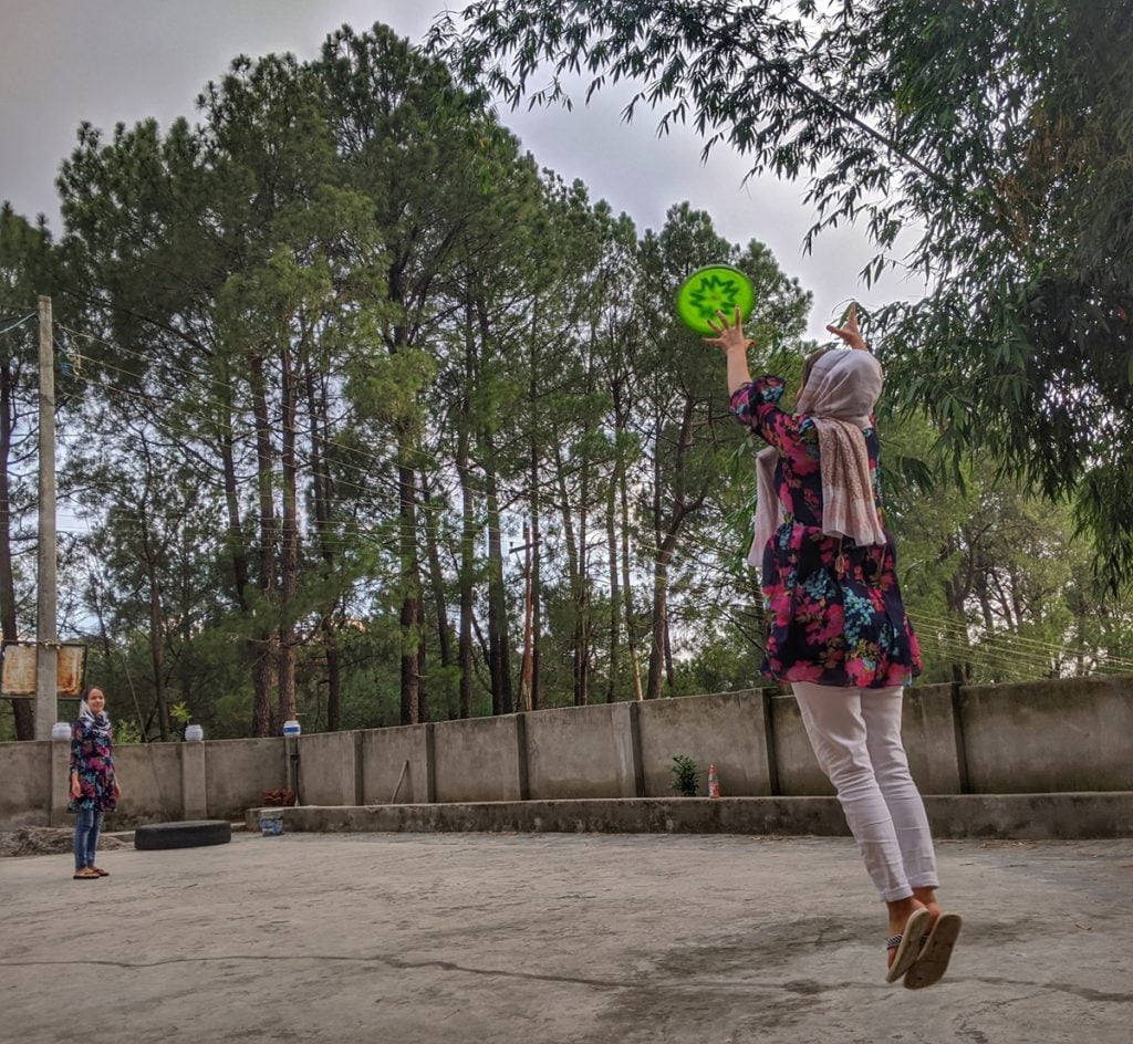 Women at Leisure: Najeeba and Samea play frisbee in the evening to pass their time during COVID lockdown.