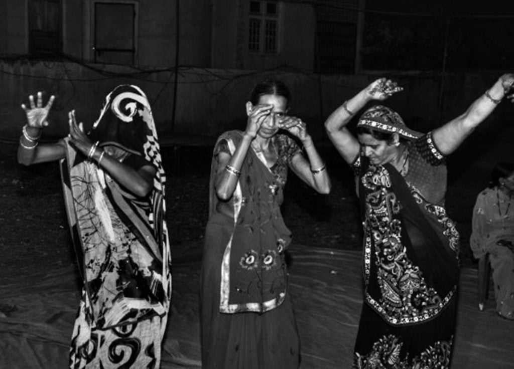 Women at Leisure: Women dancing in a wedding in presence of men in the community. It is considered immodest for daughters-in-law of the house to show their face, let alone dance, in front of men. 