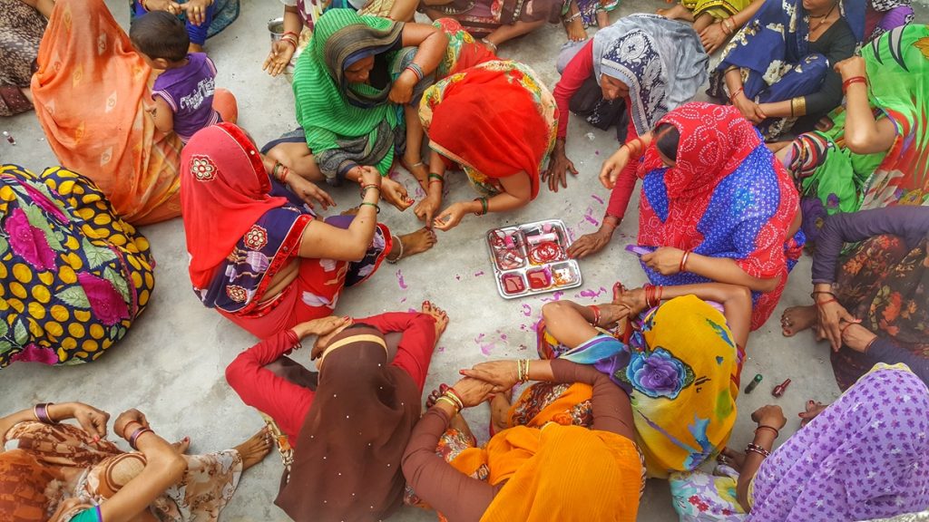 Women at Leisure: Women in a village got together to mourn and celebrate the death of someone who died after a full life. They help each other get ready for Tehravi, the grand feast arranged after someone dies.