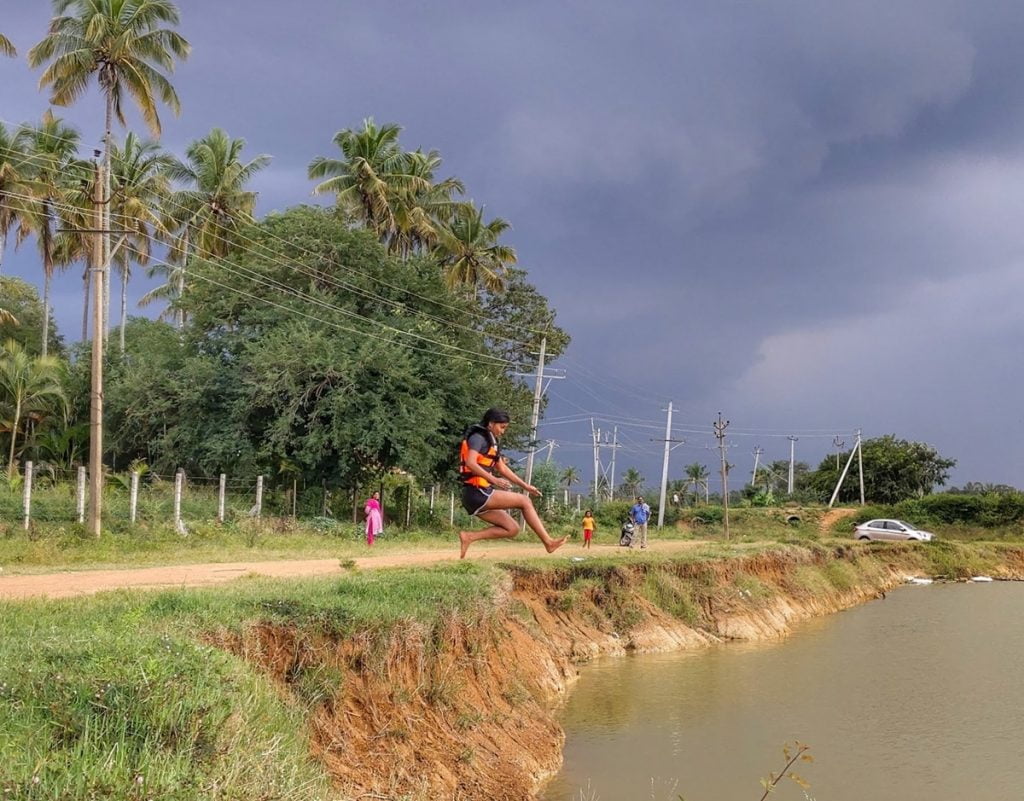 Women at Leisure: Deepa jumping into a pond which got some water due to unexpected rain