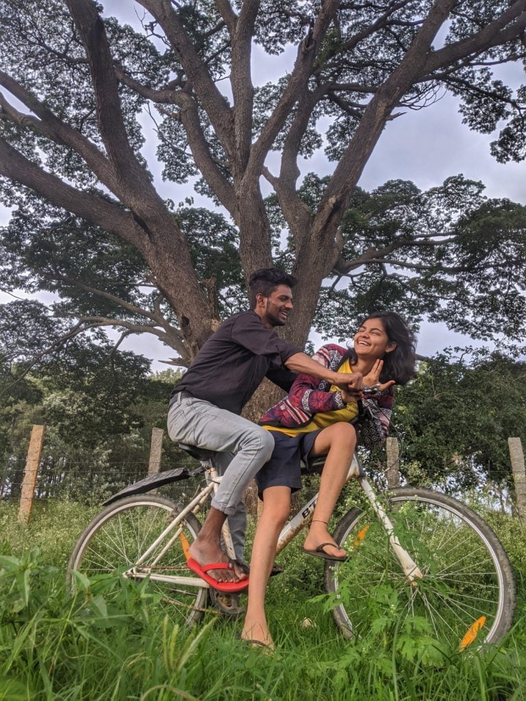 Women At Leisure: Venu enjoying a picnic with her friend Sunil on a sunny day.