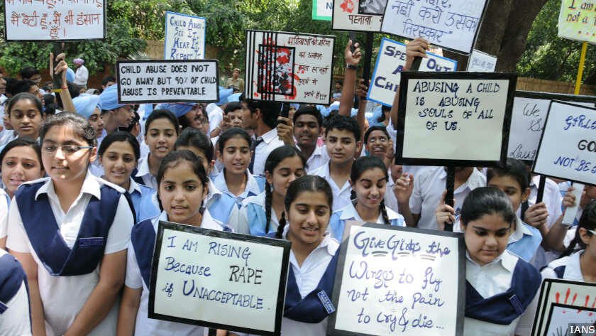 School children participating at a demonstration in protest against the rape of a 5 years old girl in New Delhi on April 23, 2013.