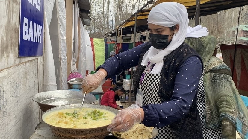 Woman waza stirring a dish. 