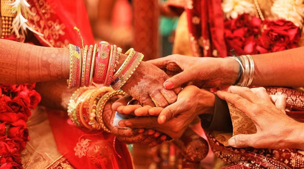 Photo of bride and groom's hands