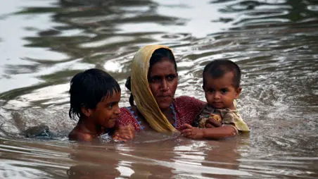 Women suffer more due to climate change/women with kids in floods