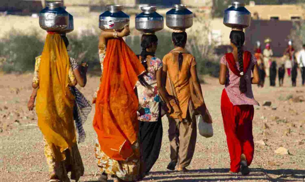 Women carrying water pots