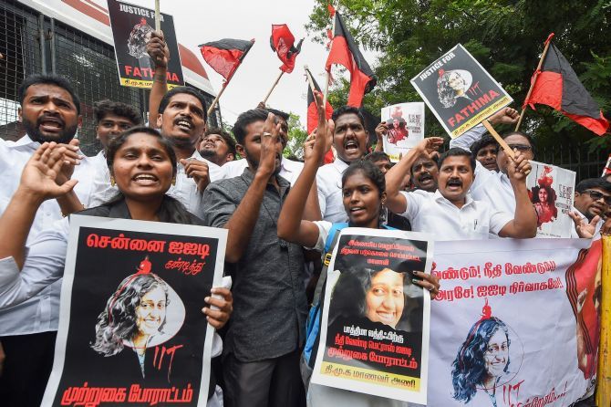 DMK youth wing cadres display placards and raise slogans during a protest demanding a fair probe in the alleged suicide case of 19-year-old student Fatima Lateef, outside IIT Madras in Chennai, on Friday. Photograph: PTI Photo