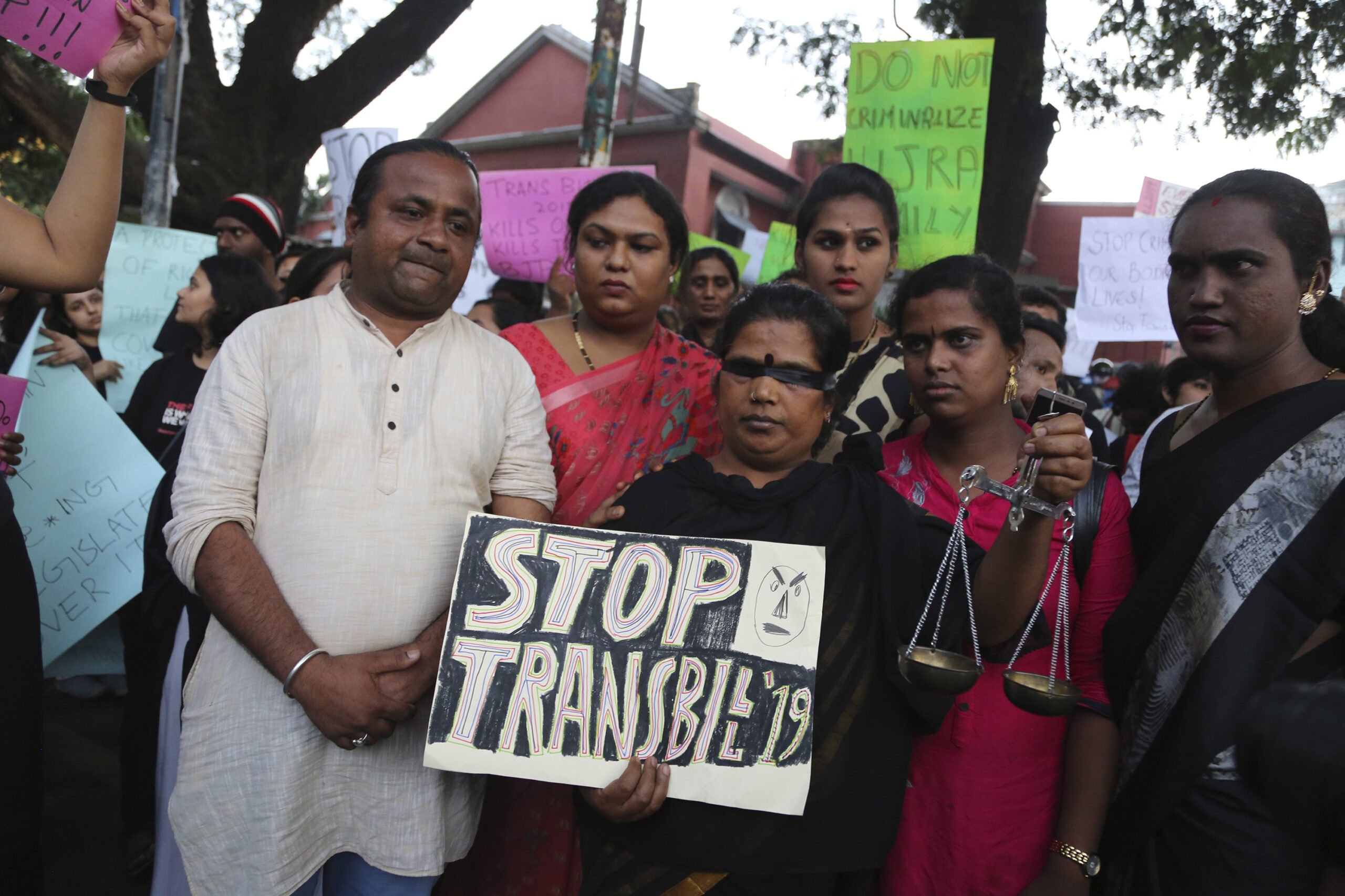 Supporters of lesbian, gay, bisexual and transgender community hold placards during a protest against passing of Transgender Persons (Protection of Rights) Bill, 2019, in Bangalore, India, Wednesday, Nov. 27, 2019