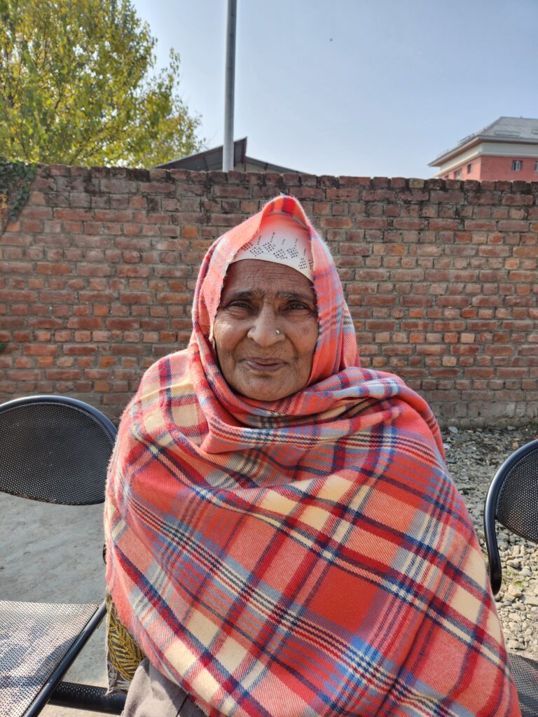 Hajara, a midwife who helps in childbirth 
