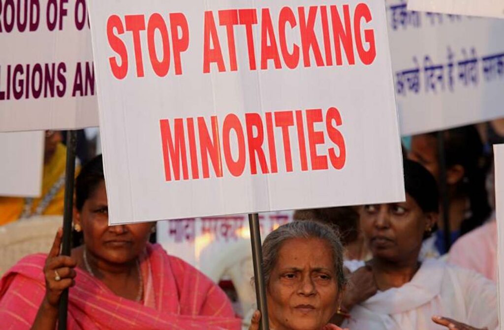 Poster saying 'stop attacking minorities'