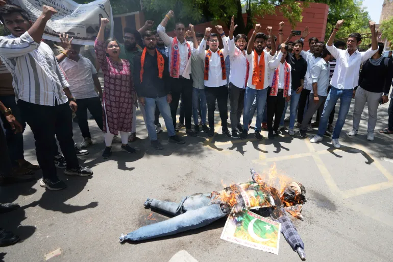 Supporters of the Akhil Bharatiya Vidhyarthi Parishad, a student organisation aligned with India's governing Bharatiya Janata Party, burn an effigy of terrorism and shout slogans against Pakistan after the killing of tourists by gunmen in Pahalgam, Indian-administered Kashmir, in Ahmedabad, India, Thursday, April 24, 2025 [Ajit Solanki/AP Photo]